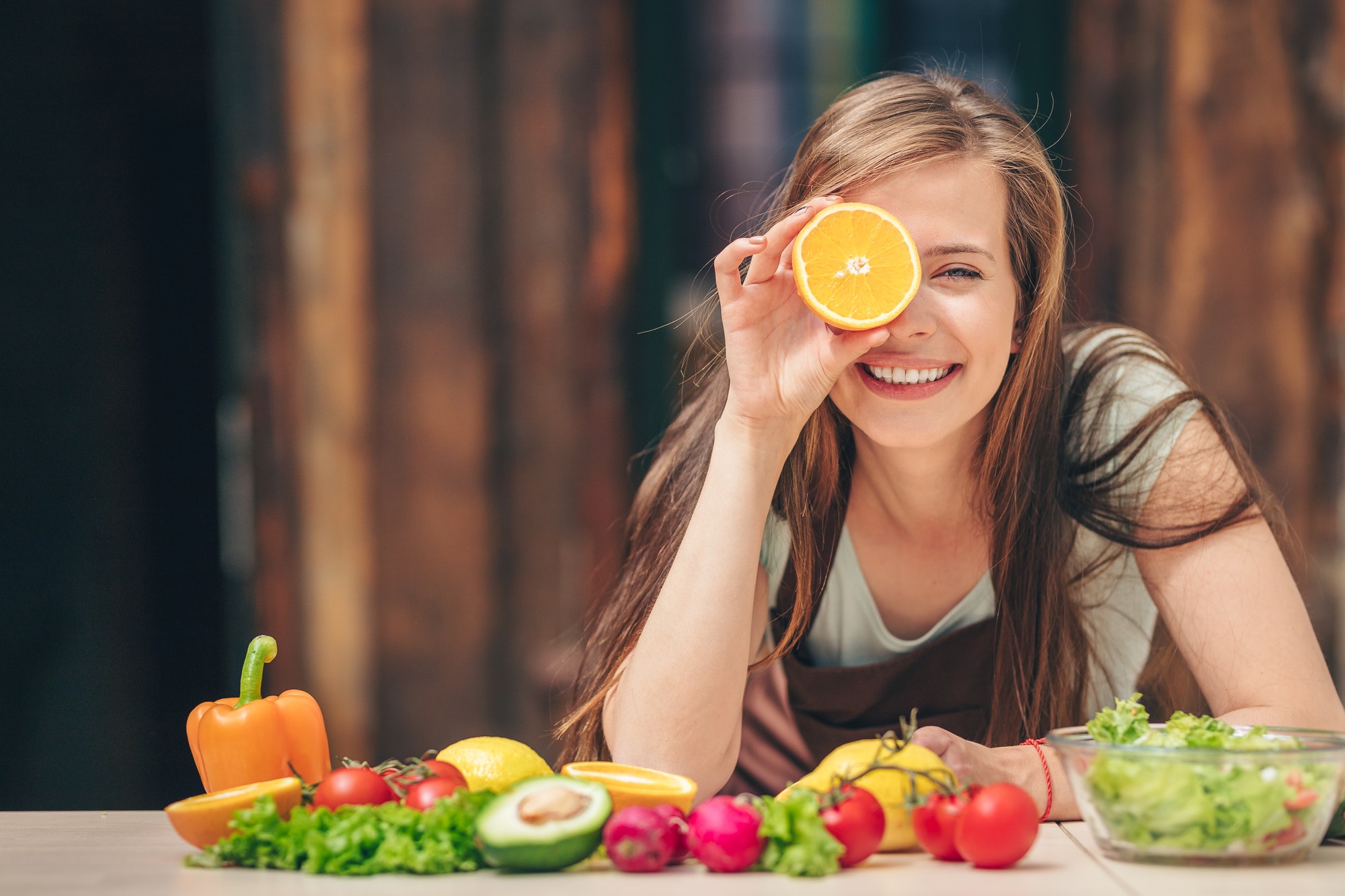 happy-young-girl-with-an-orange.jp